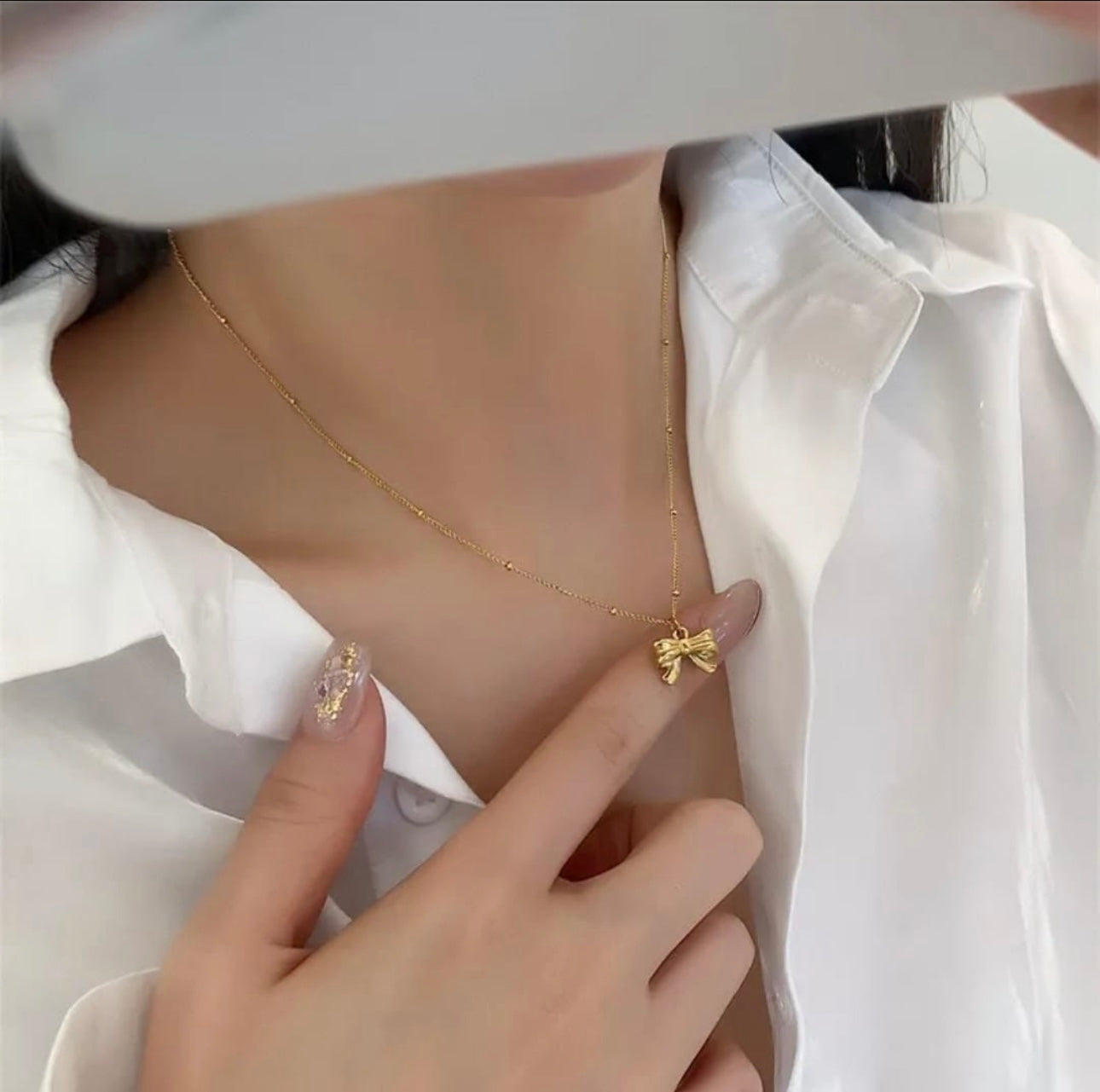 Golden Bow Pendant Necklace – Elegant Charm